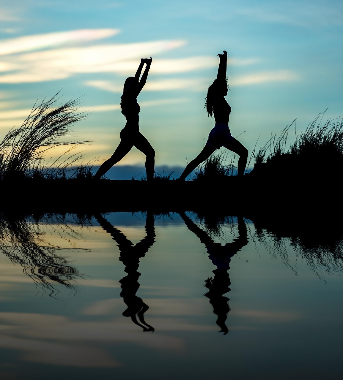 women, yoga, silhouettes, water, reflection, mirroring, water reflection, pose, posing, yoga pose, meditation, stretching, wellness, well-being, exercise, adults, nature, asia, girls, morning, outdoors, pair, people, stance, sunrise, sunset